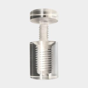 Skiltfester av blank transparent akryl. Diameter 13 mm. Avstand fra veg: 19 mm.